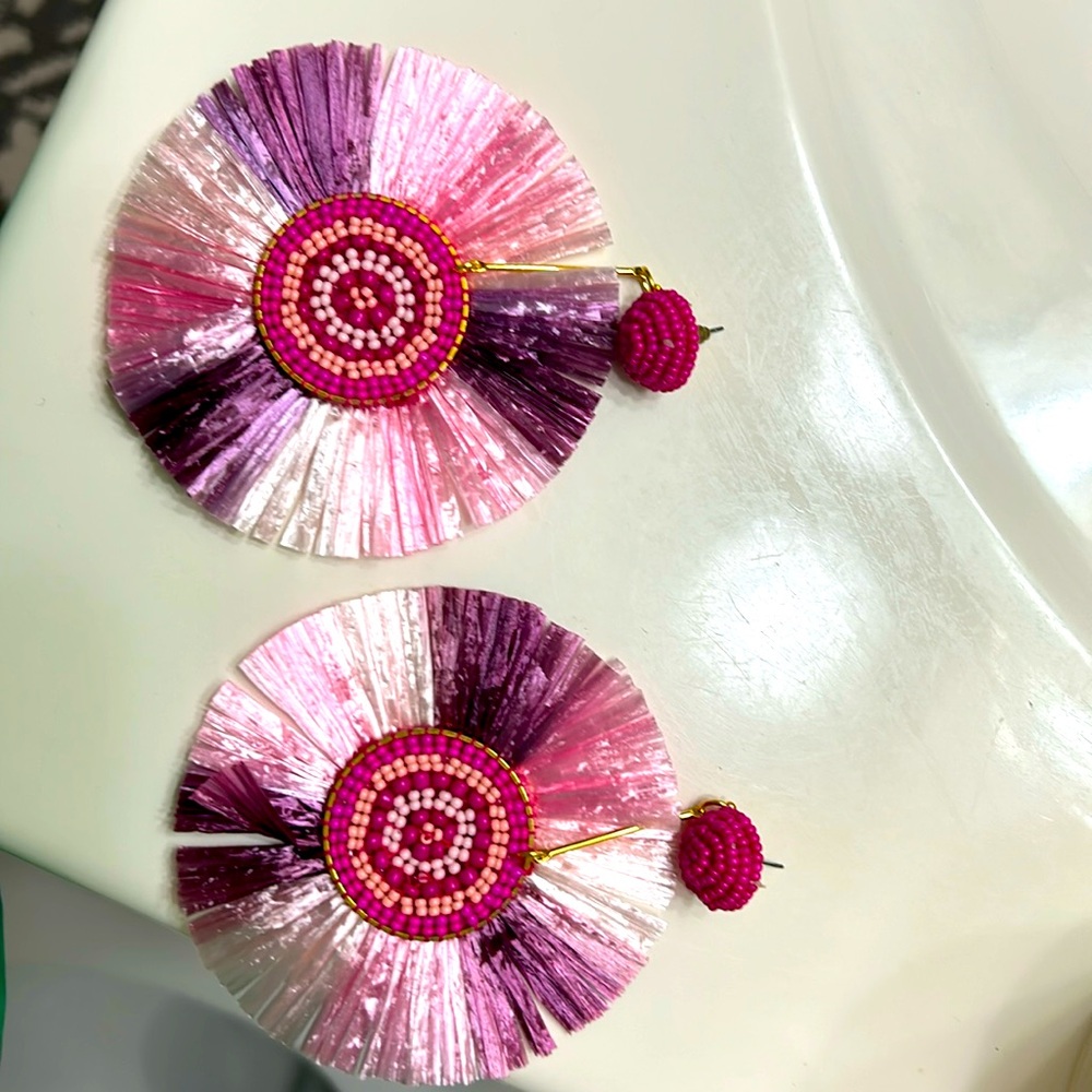 Pink post earrings 3 inch by 3 inch , beaded in center.